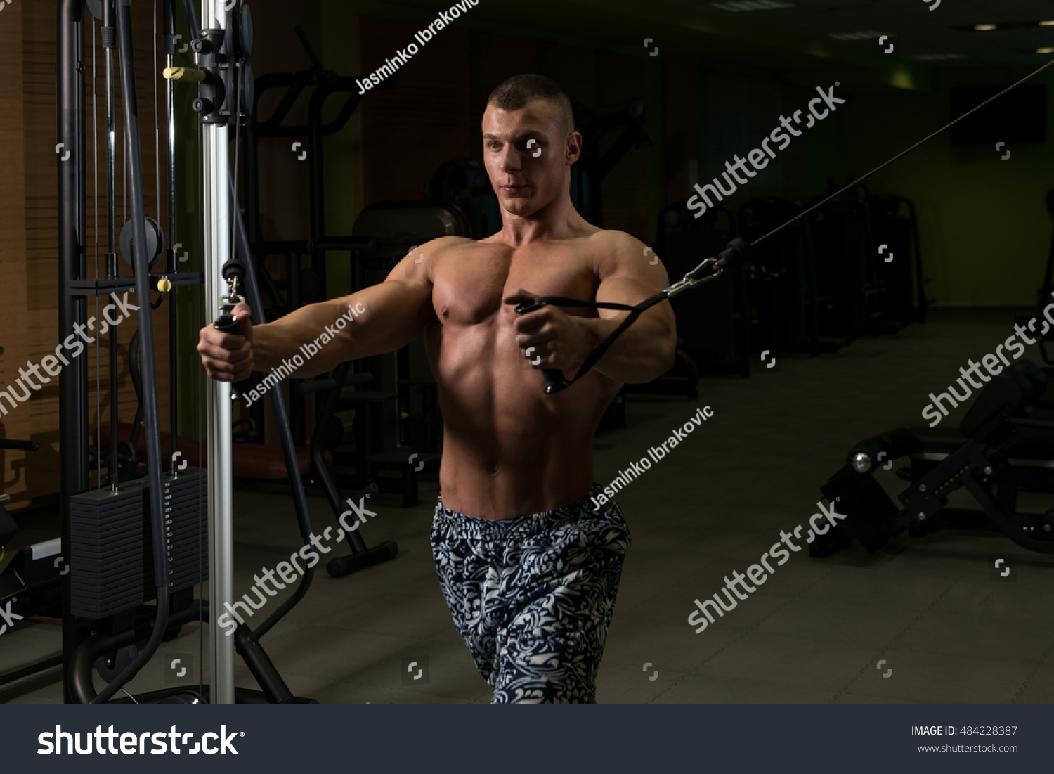 Young Bodybuilder Working On His Chest Stock Photo (Edit Now) 484228387 ...