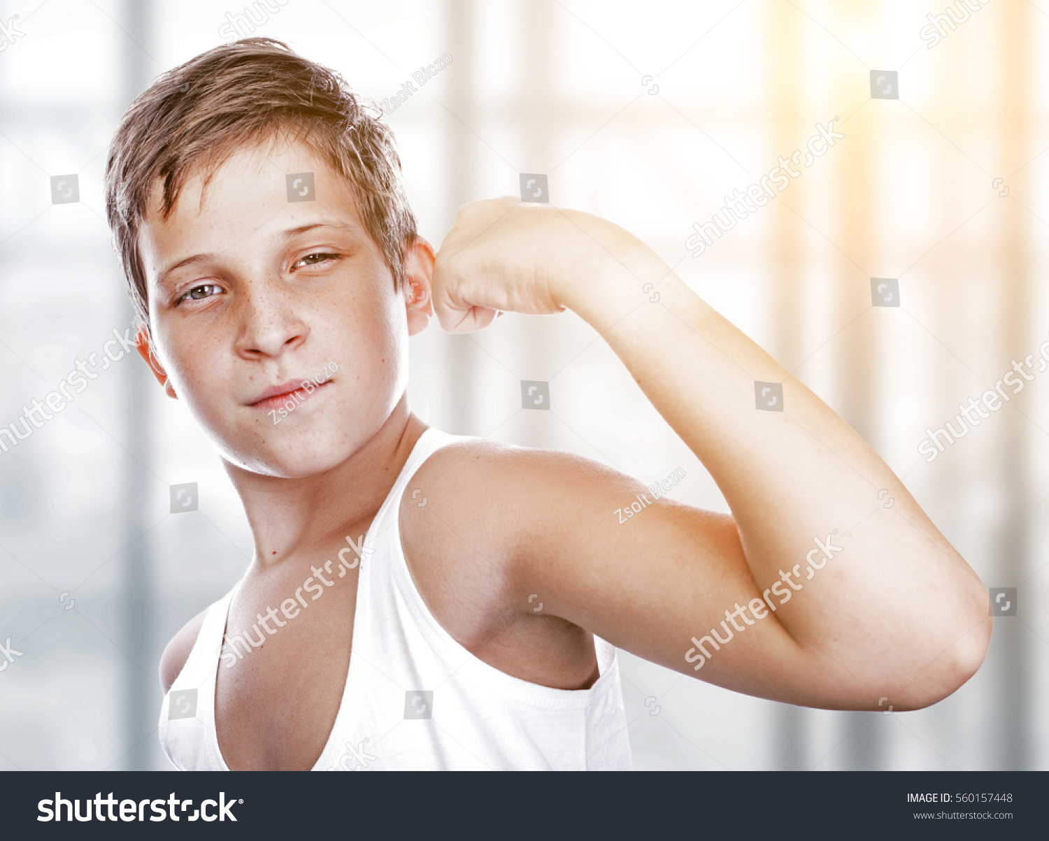 Young Boy Flexing Biceps Foto De Stock 560157448 Shutterstock