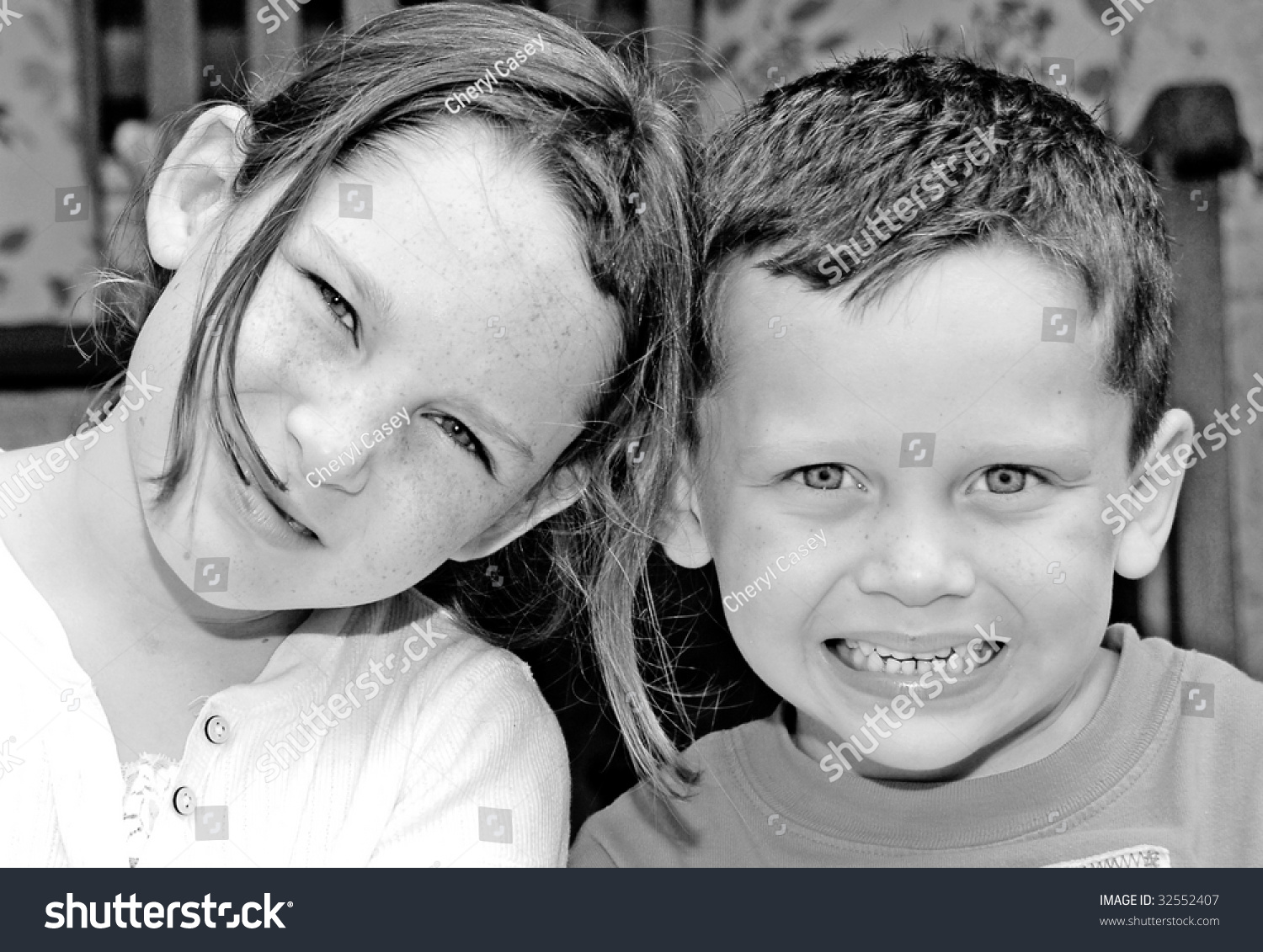 Young Brother Sister Sharing Sweet Moment Stock Photo 32552407