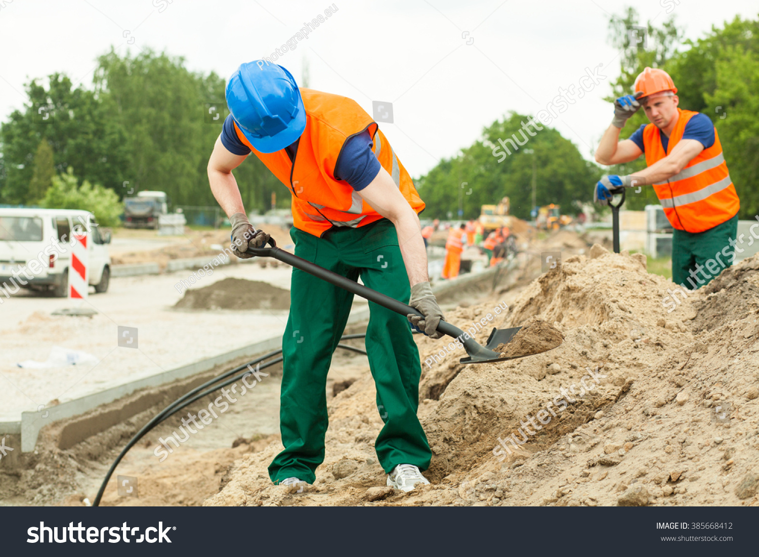 Young Construction Worker Working Hard With Spade Stock Photo 385668412 ...