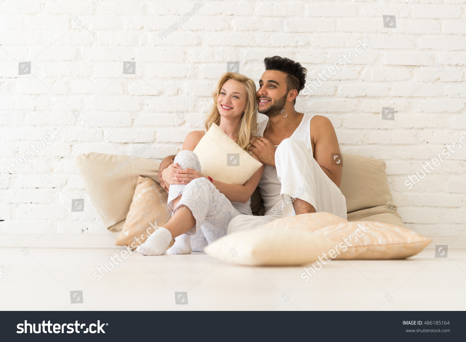 Young Couple Sit On Pillows Floor Stock Photo 486185164 Shutterstock