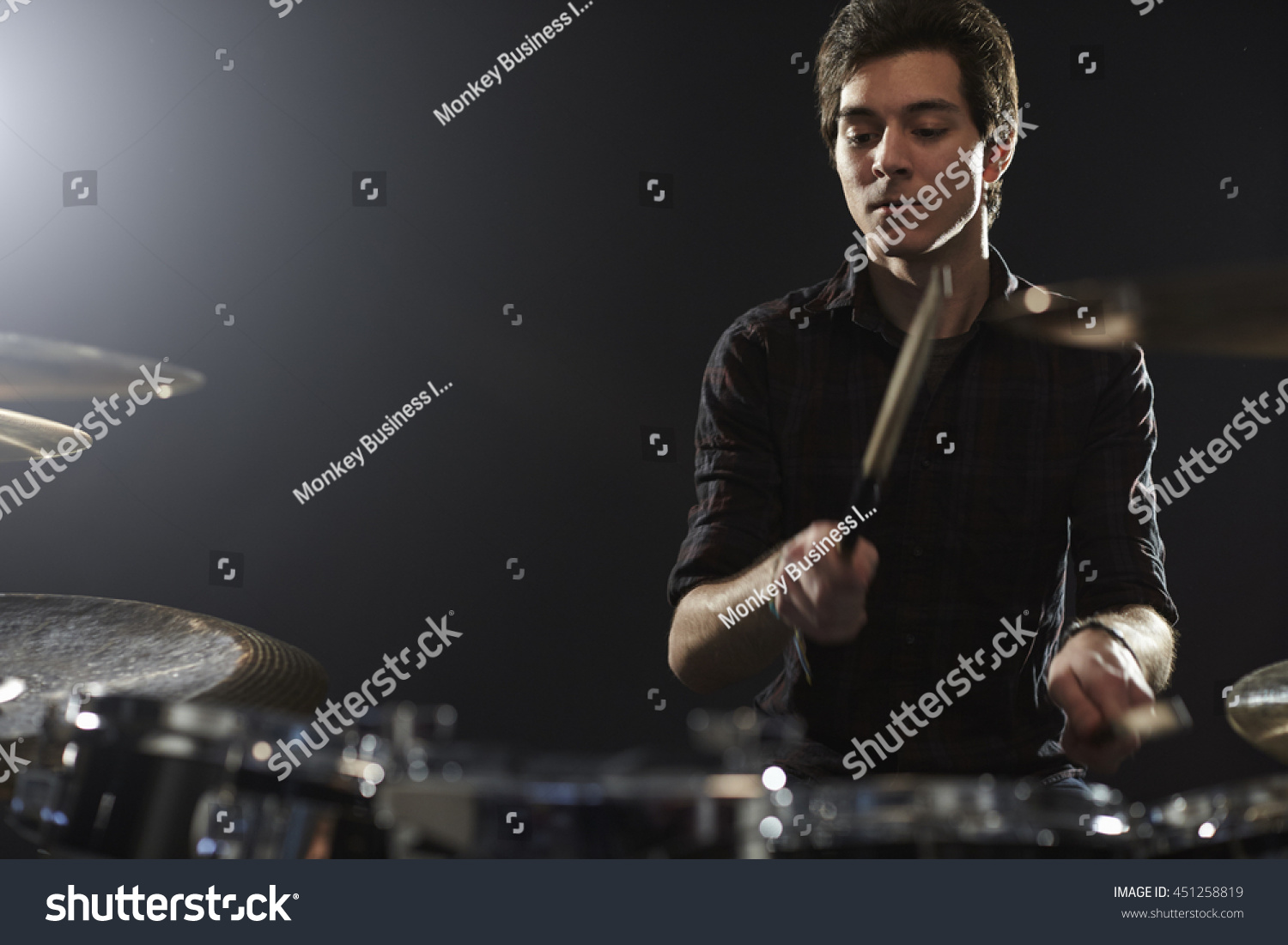 Young Drummer Playing Drum Kit In Studio Stock Photo 451258819 ...