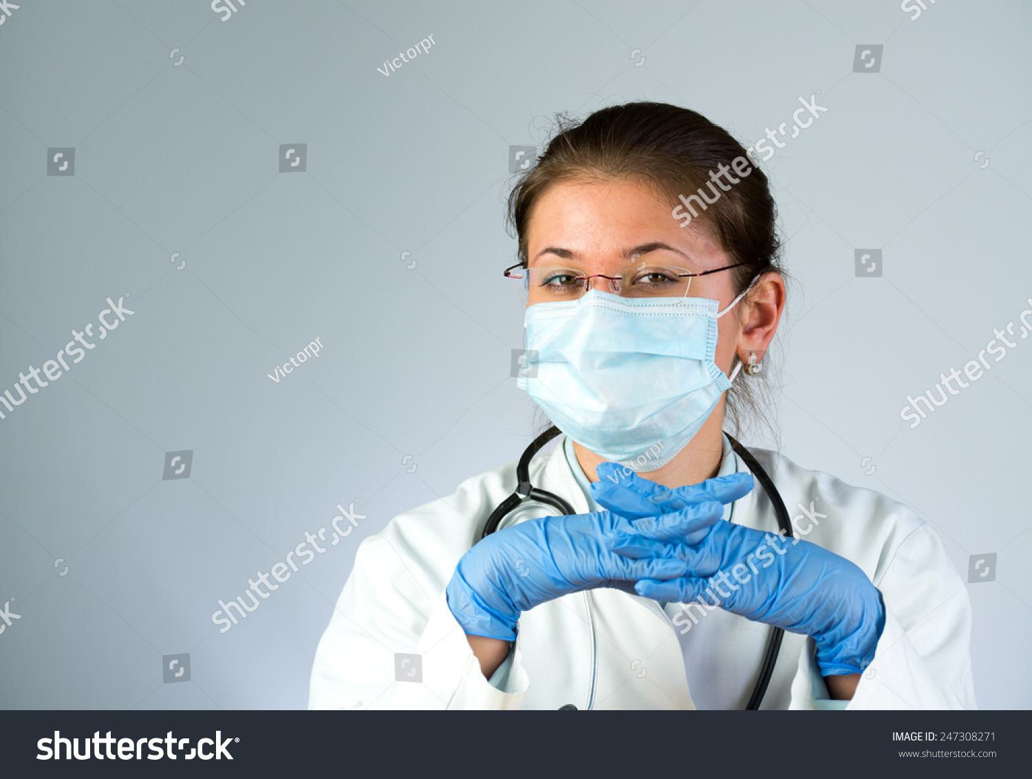 Young Female Doctor Wearing Latex Gloves Stock Photo 247308271 ...