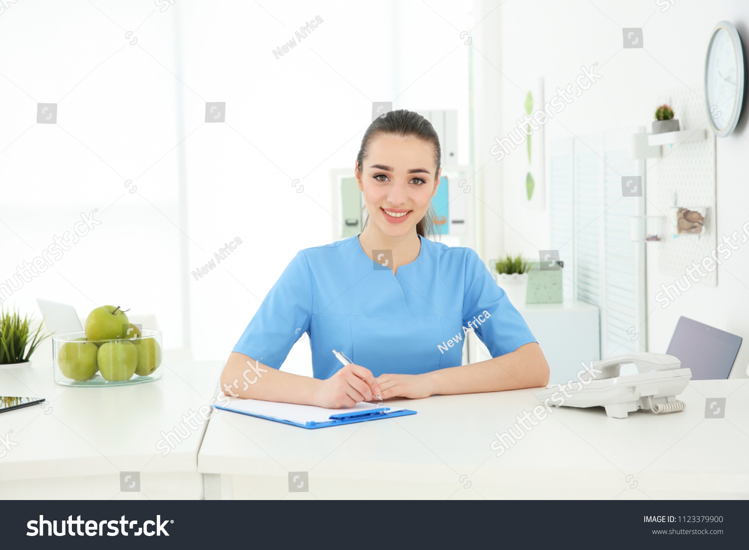 Young Female Receptionist Working Hospital Stock Photo Edit Now