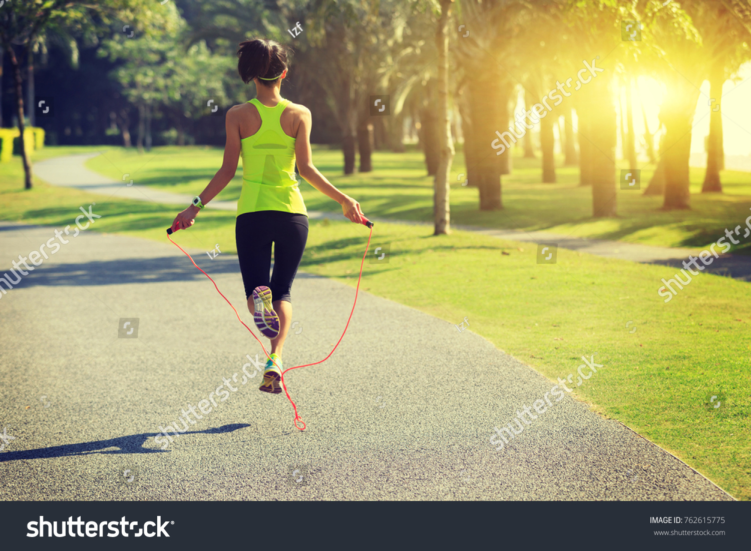 Young Fitness Woman Jumping Rope Tropical Stock Photo 762615775
