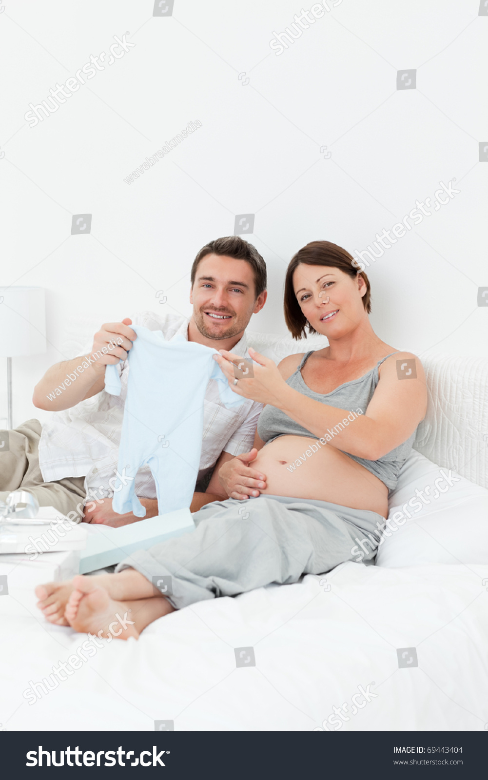 Young Futur Parents Chlidrens Clothes Home Stock Photo Edit Now Young Futur Parents Chlidrens Clothes Home Stock Photo Edit Now