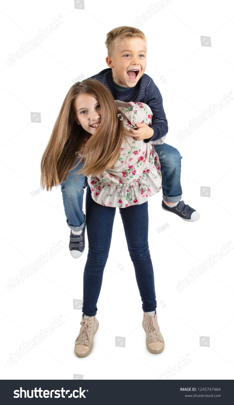 Girl Carrying Little Boy On Stock Photo 