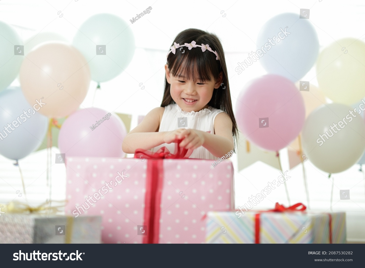 Young Girl Celebrating Her 5th Birthday Stock Photo 2087530282