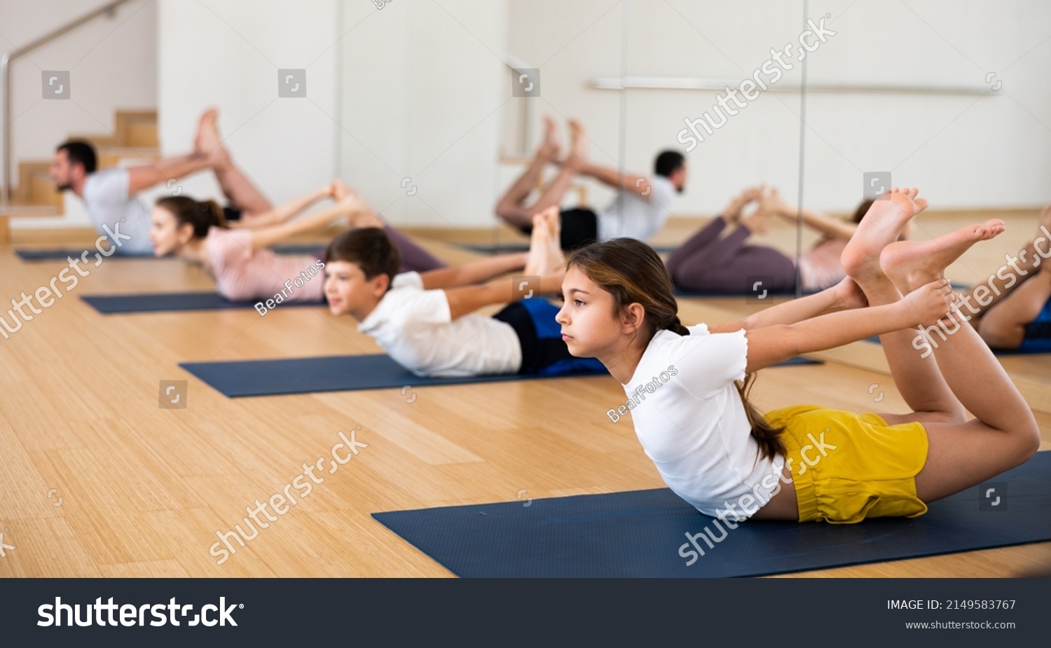 Young Girl Exercising Bow Pose Her Stock Photo 2149583767 | Shutterstock