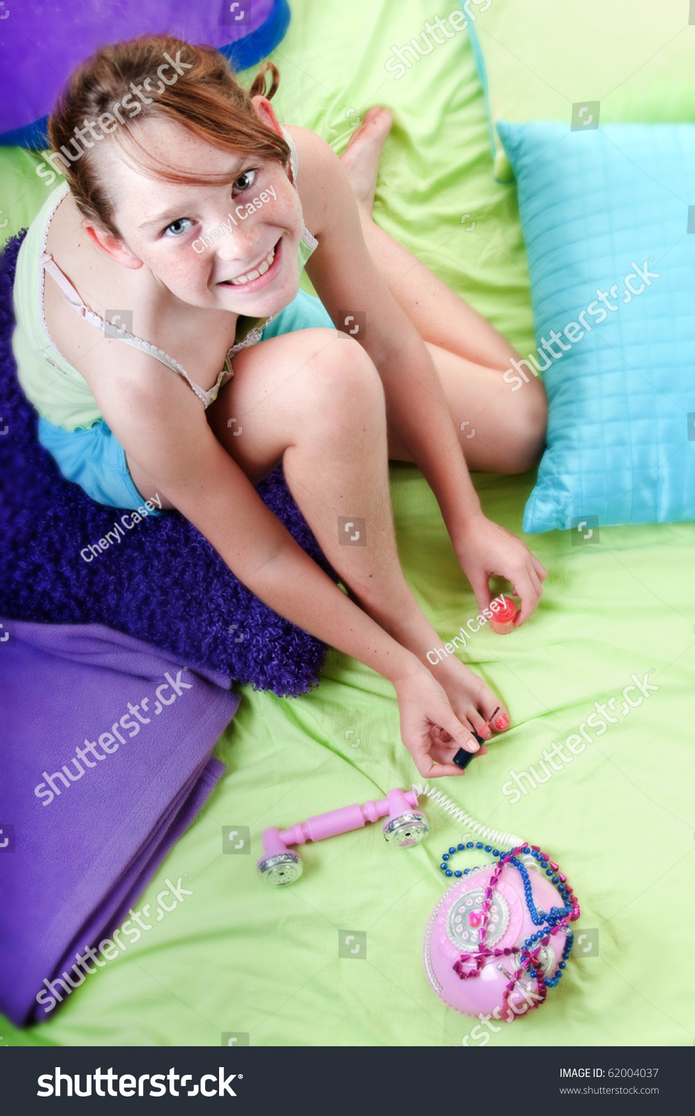 Young Girl Painting Toenails Stock Photo 62004037 Shutterstock   Stock Photo Young Girl Painting Toenails 62004037 