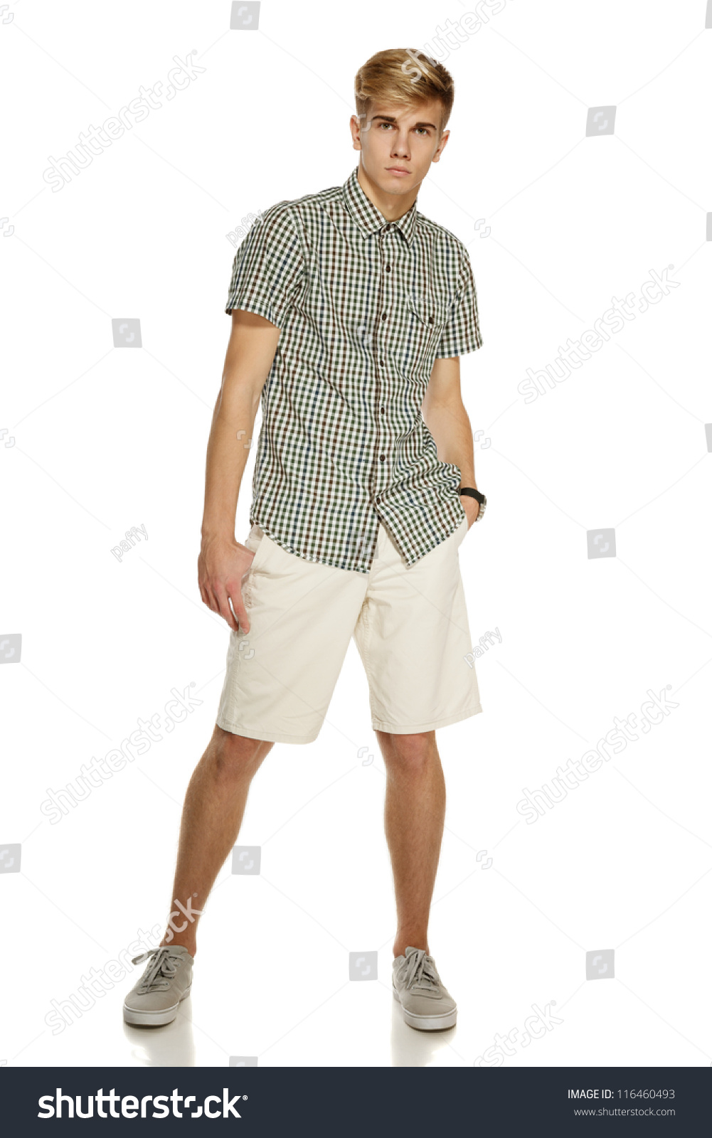 Young Handsome Male In Shorts Posing In Full Length Over White ...