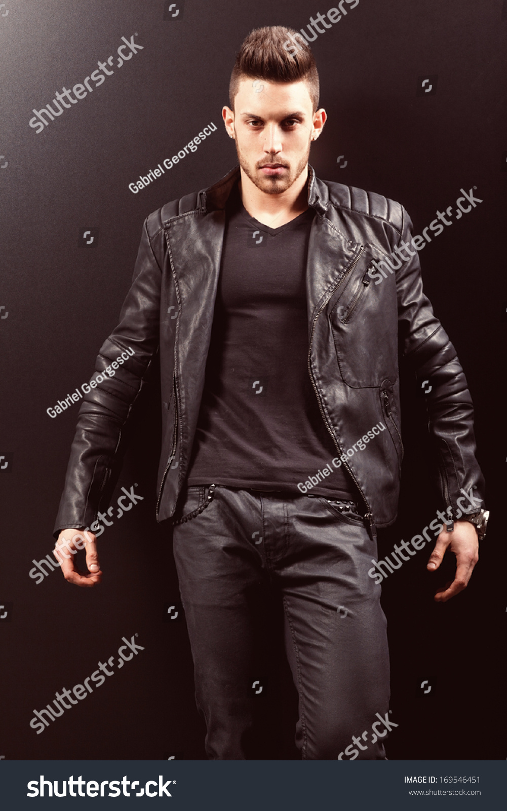 Young Handsome Man. Studio Fashion Portrait. Posing Over Black ...