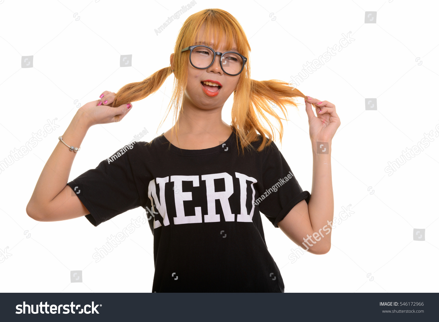 Grinning nerdy girl dances in her underwear