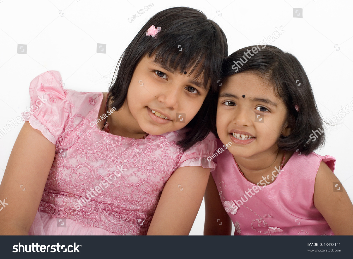 Young Happy Young Asian Sisters In Pink Dress At Play Stock Photo ...