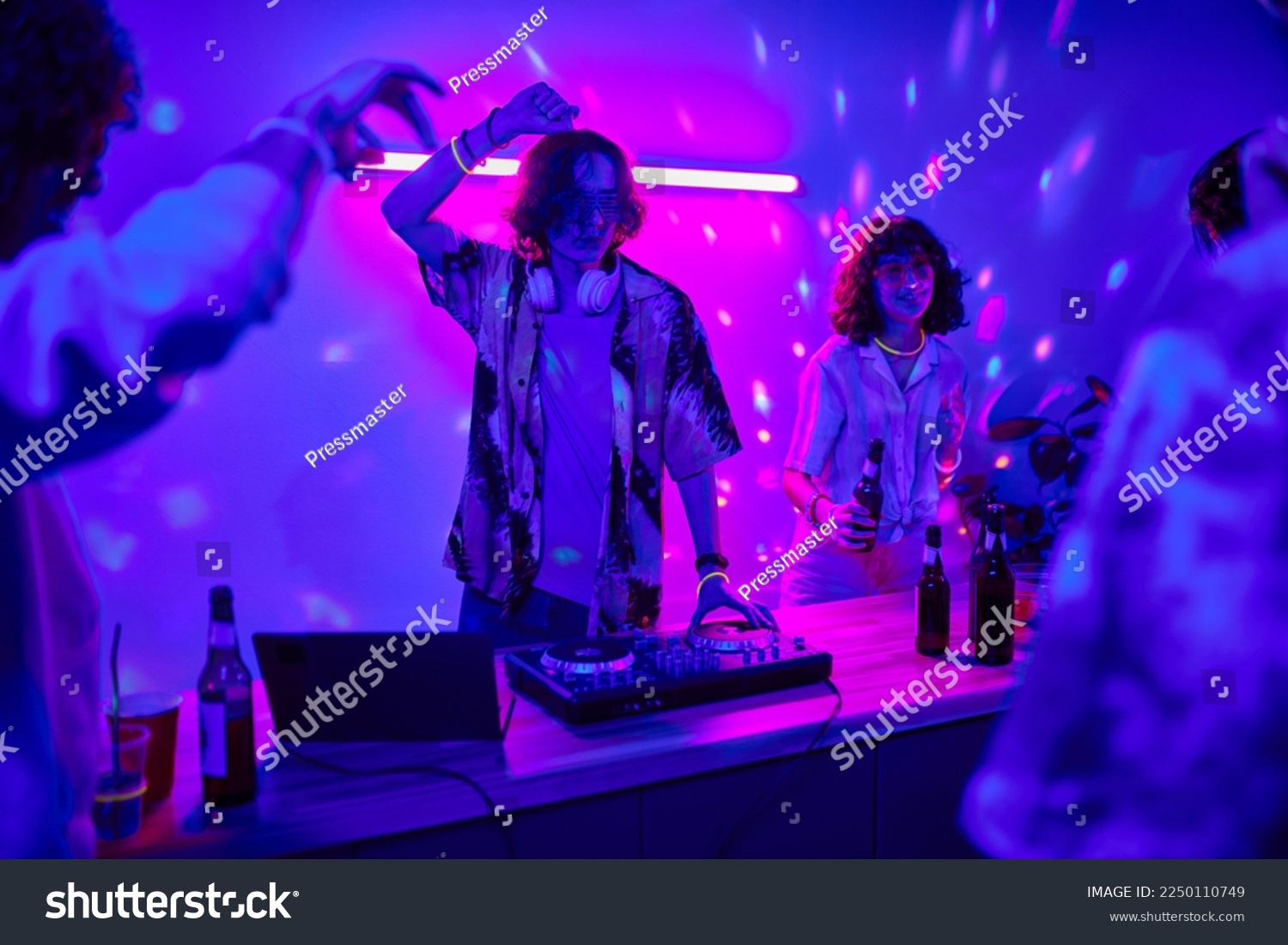  Royal Blue Classic  Template Design Featuring Young Male Deejay Creating Music