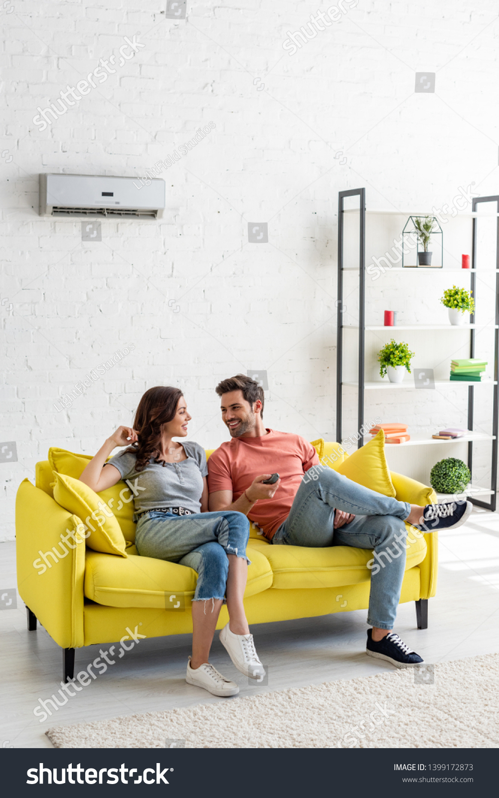 Young Man Woman Talking While Sitting Stock Photo Edit Now 1399172873 Young Man Woman Talking While Sitting Stock Photo Edit Now 1399172873