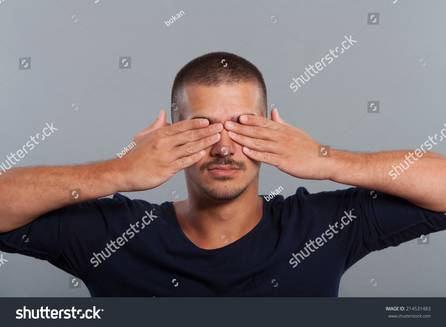 Young Man Covers Eyes His Hands Stock Photo 214531483 - Shutterstock