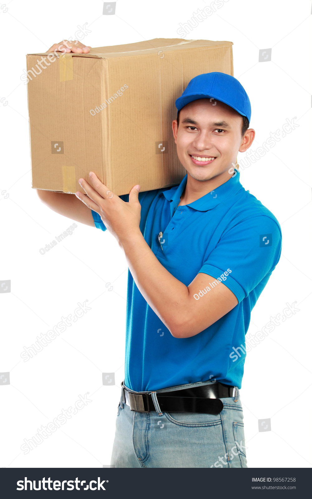 Young Man Delivery In Blue Uniform With Packages Isolated On White ...