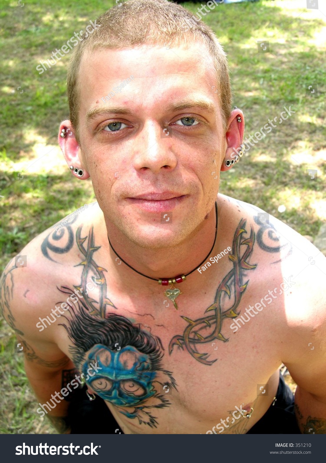 young man heavily tattooed pierced ears stock photo 351210 young man heavily tattooed pierced ears stock photo 351210