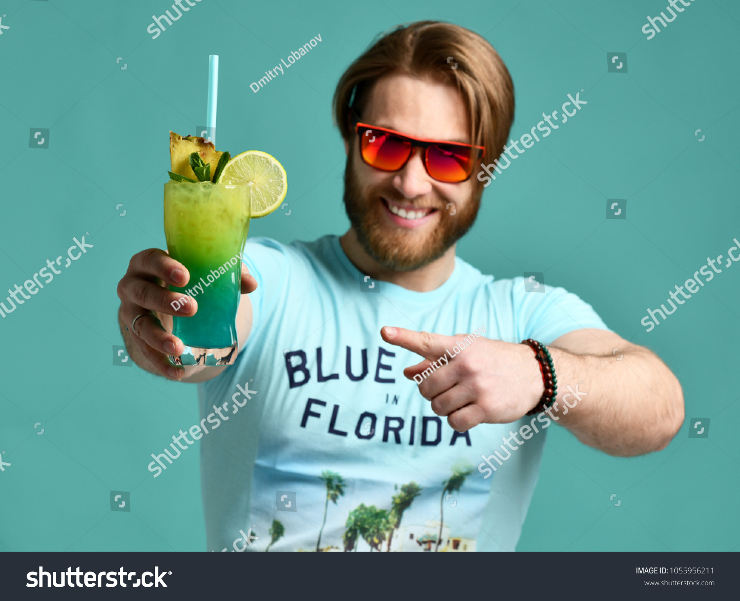 Young Man Hold Blue Hawaiian Margarita Stock Photo Edit Now 1055956211