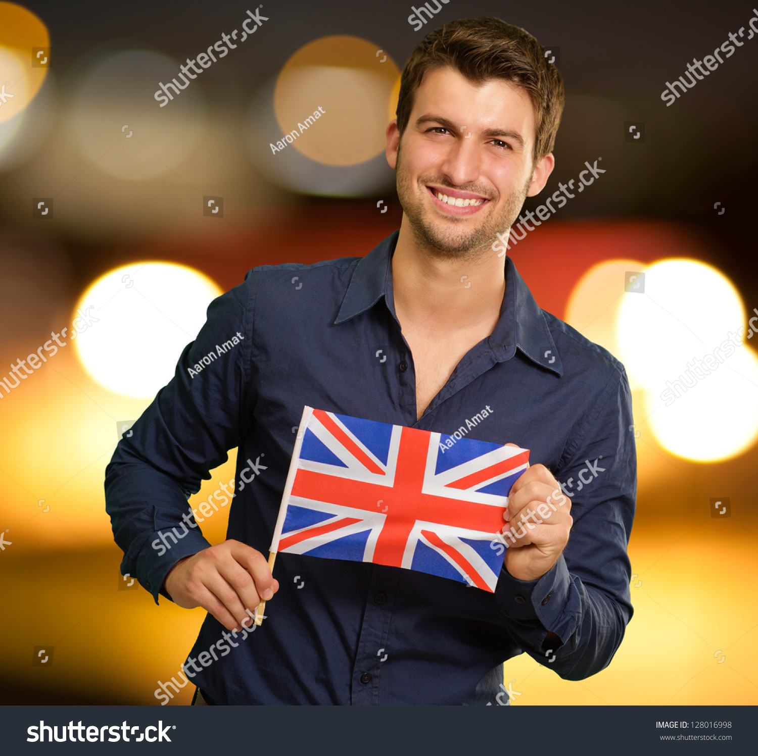 Young Man Holding Flag Of United Kingdom, Outdoors Stock Photo ...