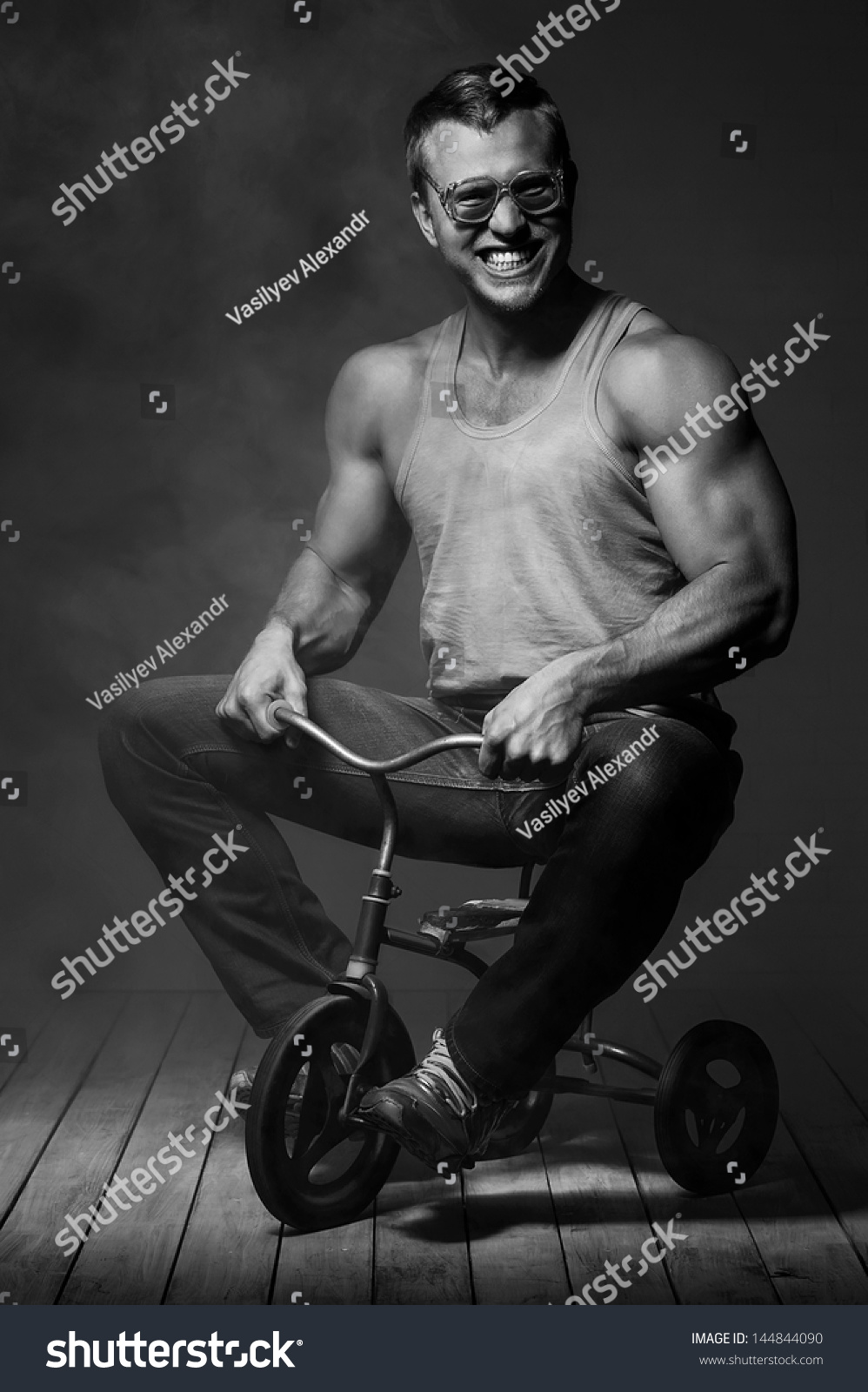 man on small bike