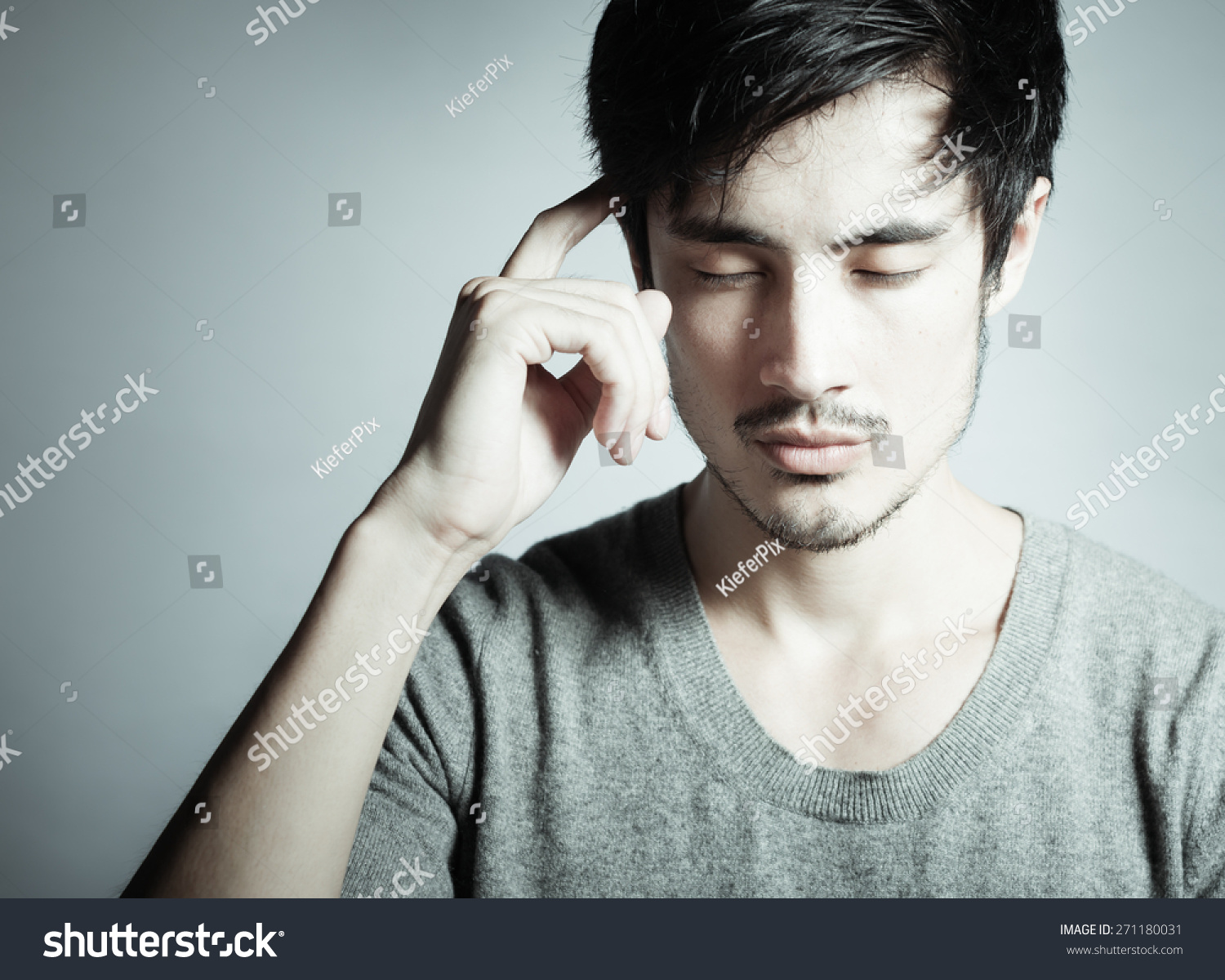 young-man-deep-thought-stock-photo-271180031-shutterstock