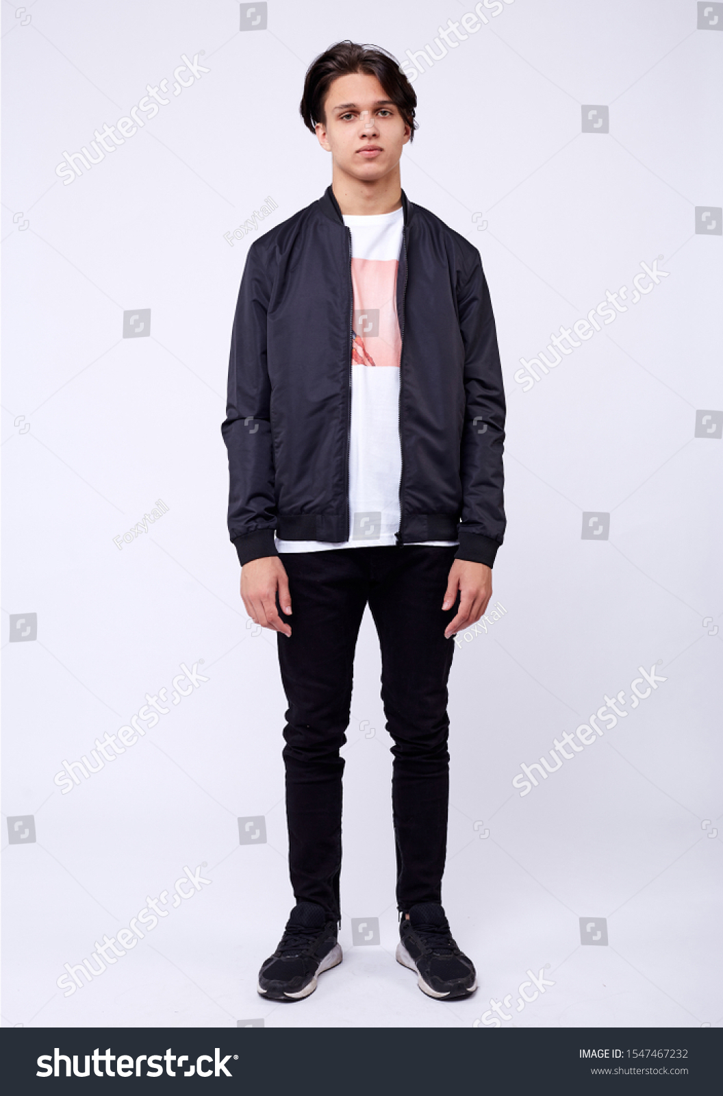 black bomber jacket blue jeans