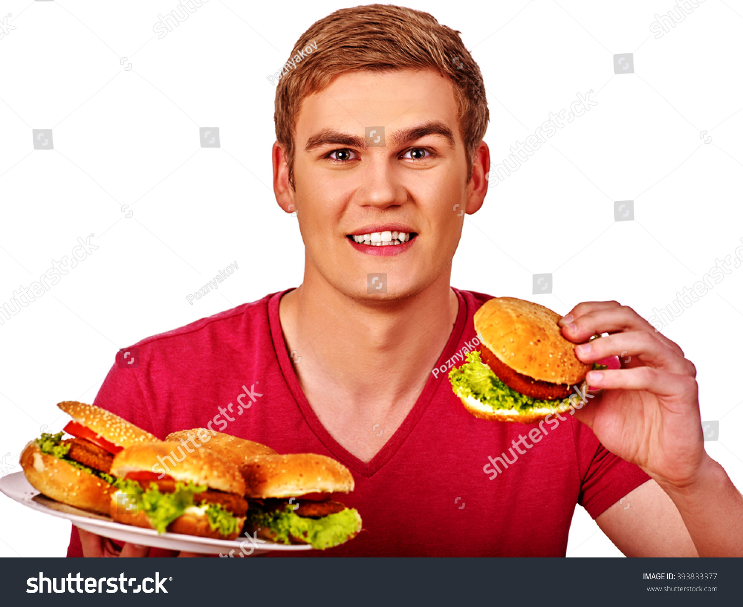 stock-photo-young-man-keeps-and-eating-a-lot-of-big-hamburgers-fastfood-concept-393833377.jpg