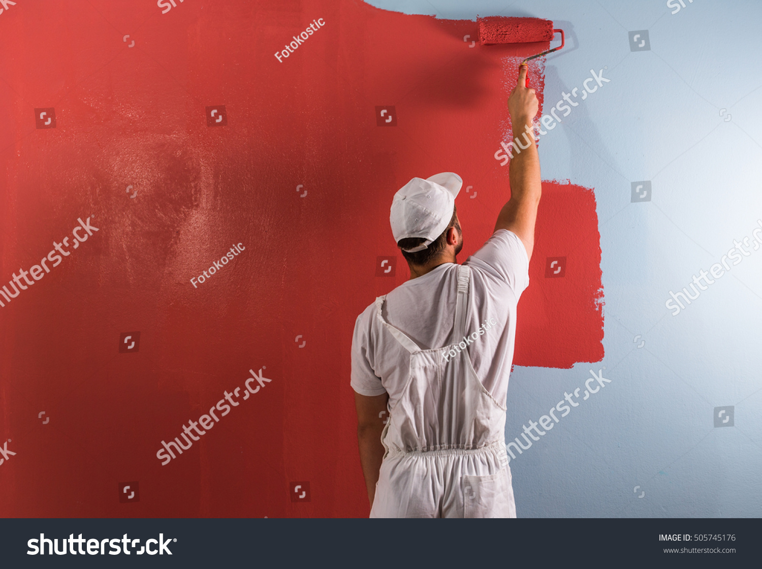 Young Man Painting Wall Roller Stock Photo Royalty Free 505745176