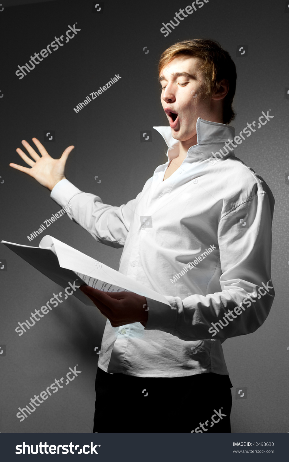 Young Man Sings With Notes Stock Photo 42493630 : Shutterstock