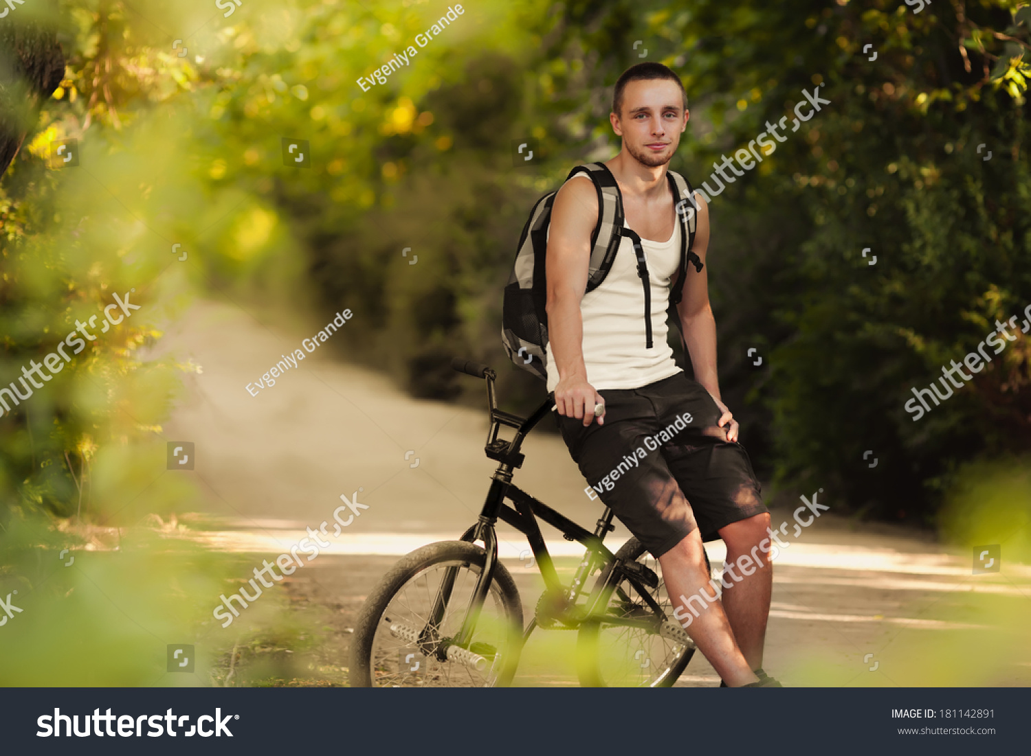 Young Man Sitting On Bike Stock Photo 181142891 : Shutterstock