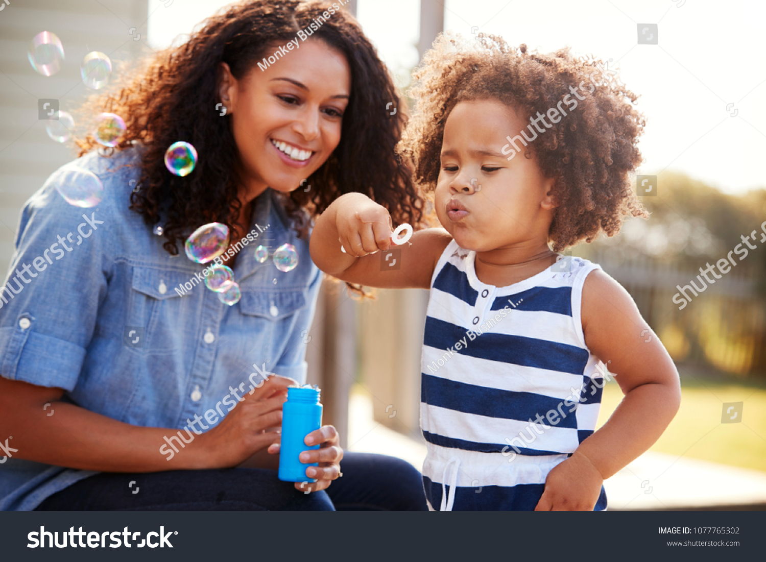 391 Mum blowing bubbles with child Images, Stock Photos & Vectors ...