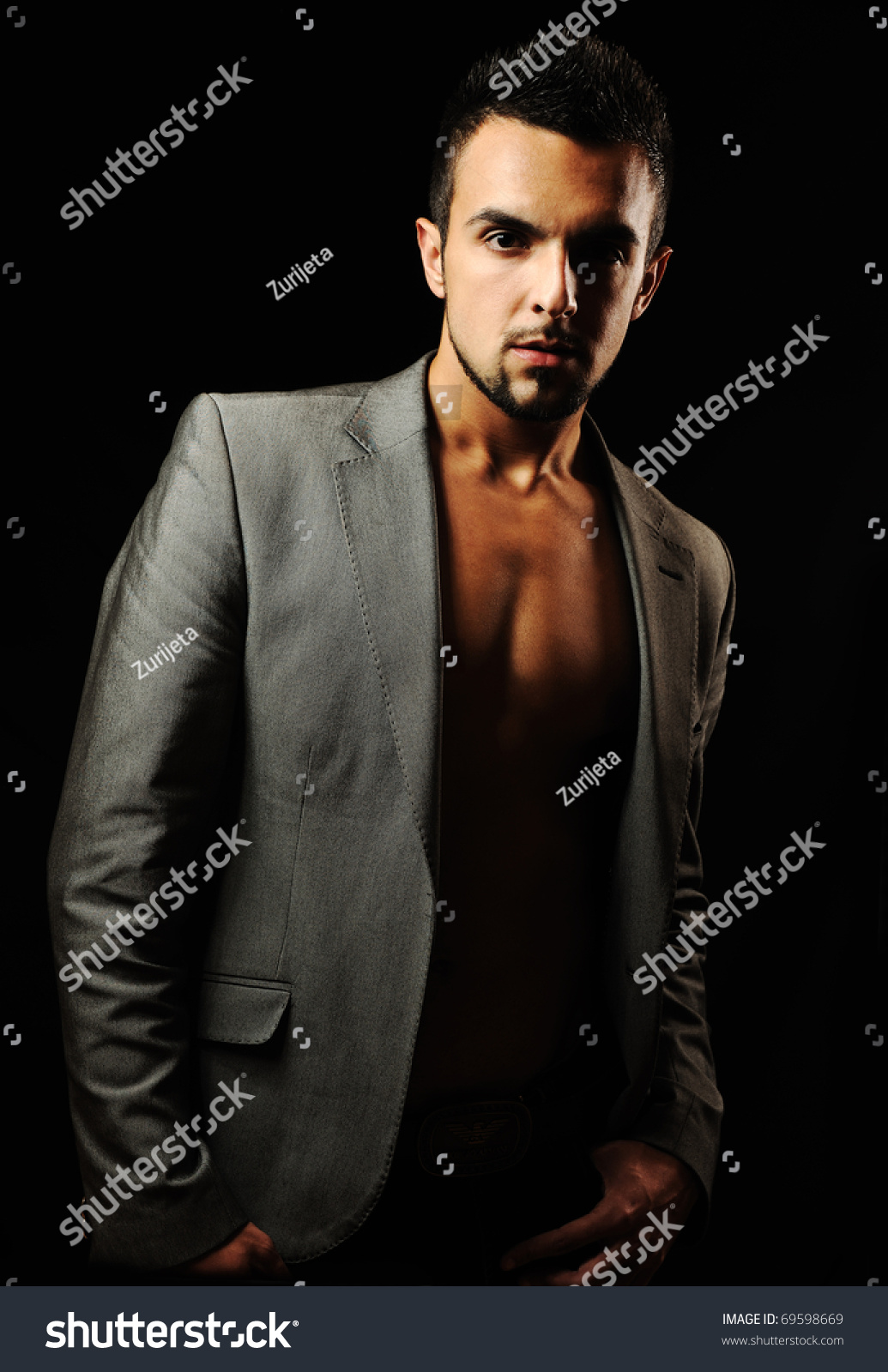 Young Modern Style Macho Man Is Posing , Studio Shot Stock Photo ...