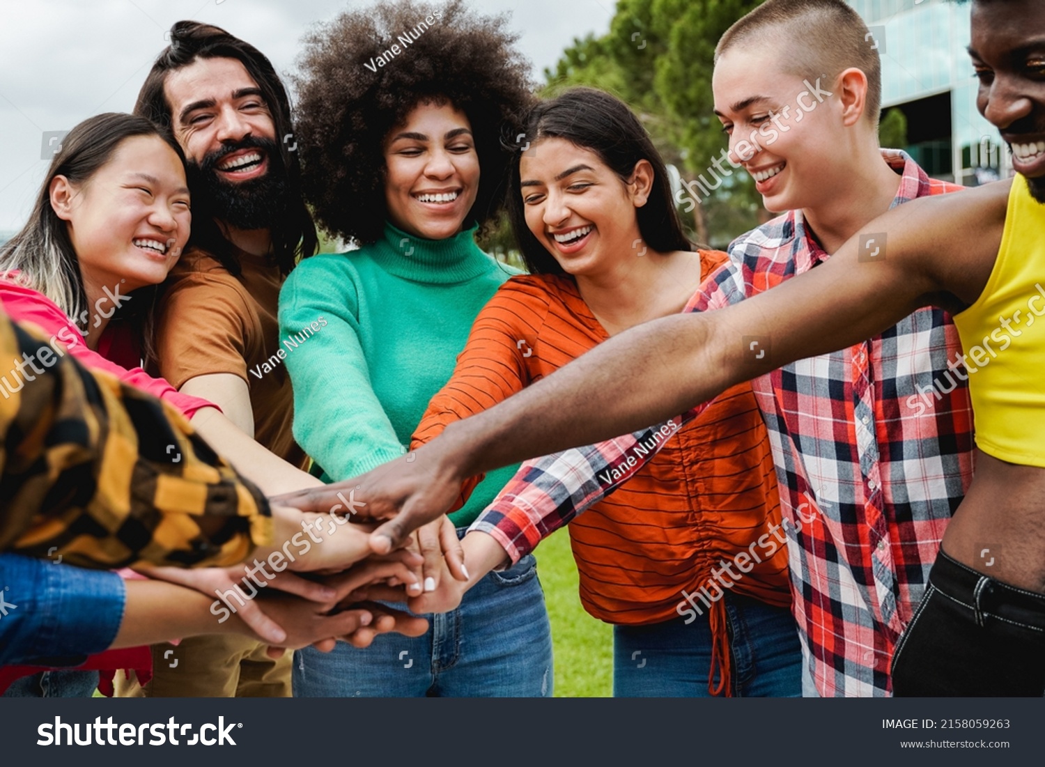 Young Multiethnic Group People Stacking Hands Stock Photo 2158059263 ...