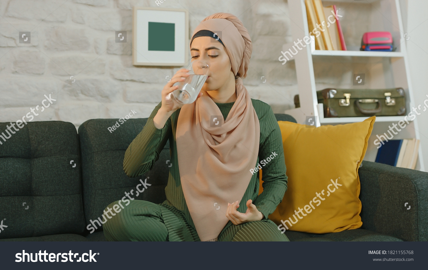 Young Muslim Woman Hijab Drinking Water Stock Photo (Edit Now) 1821155768