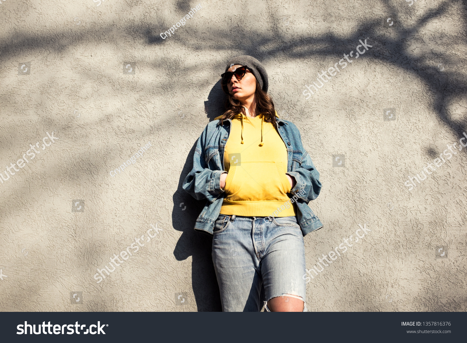 denim jacket with yellow hoodie