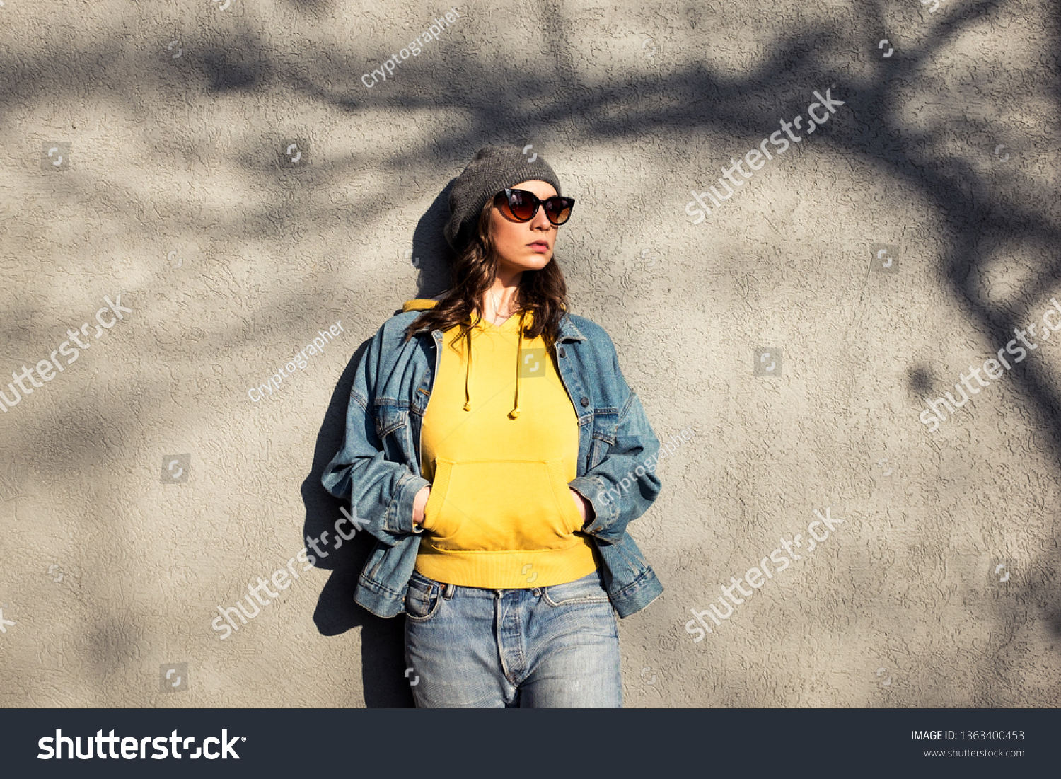 denim jacket with yellow hoodie