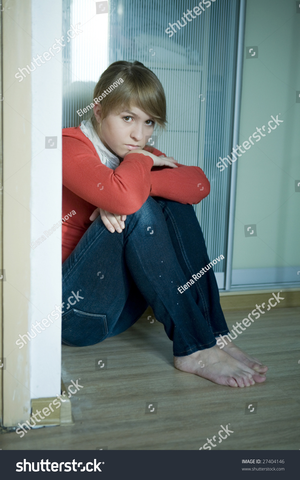 Young Sad Girl Sitting On Corner In Room. Teen`S Problem Stock Photo ...