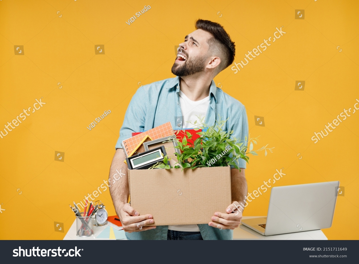 young-sad-indignant-disappointed-employee-business-stock-photo