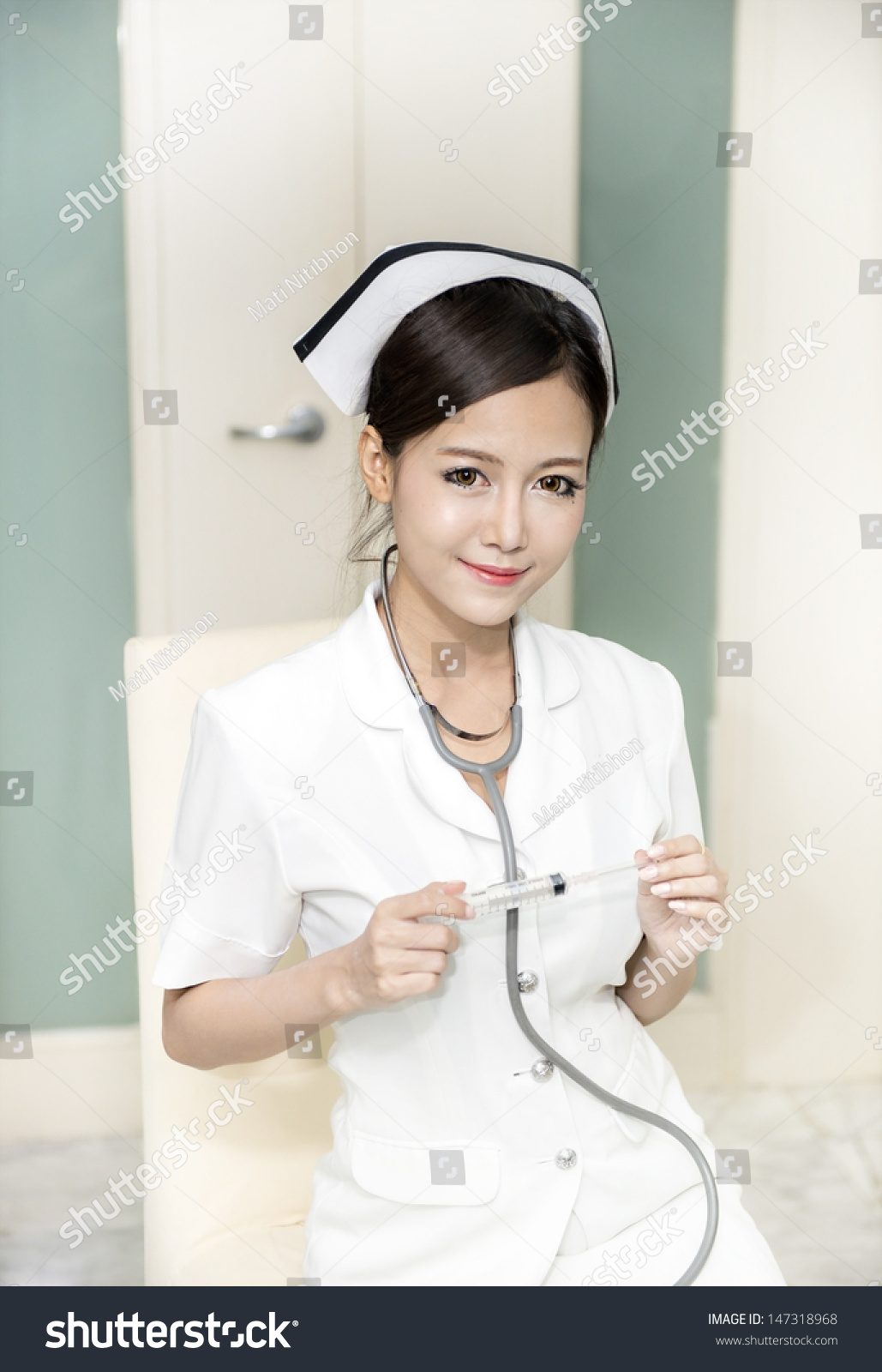 Young Sexy Female Nurse White Uniform Stock Photo -9431