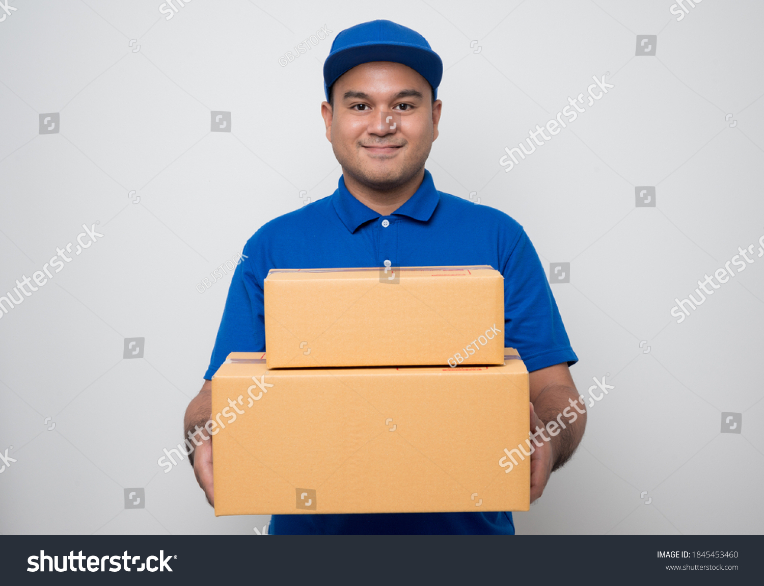 Young Smiling Asian Delivery Man Blue Stock Photo 1845453460 | Shutterstock