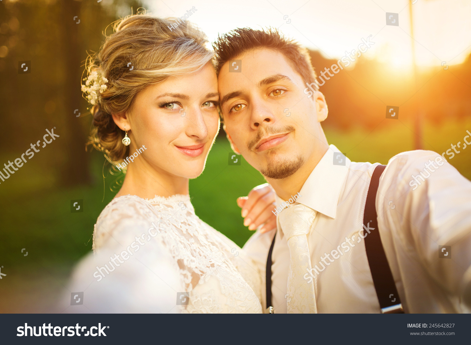 Young Wedding Couple Taking A Selfie Of Themselves As They Enjoy ...