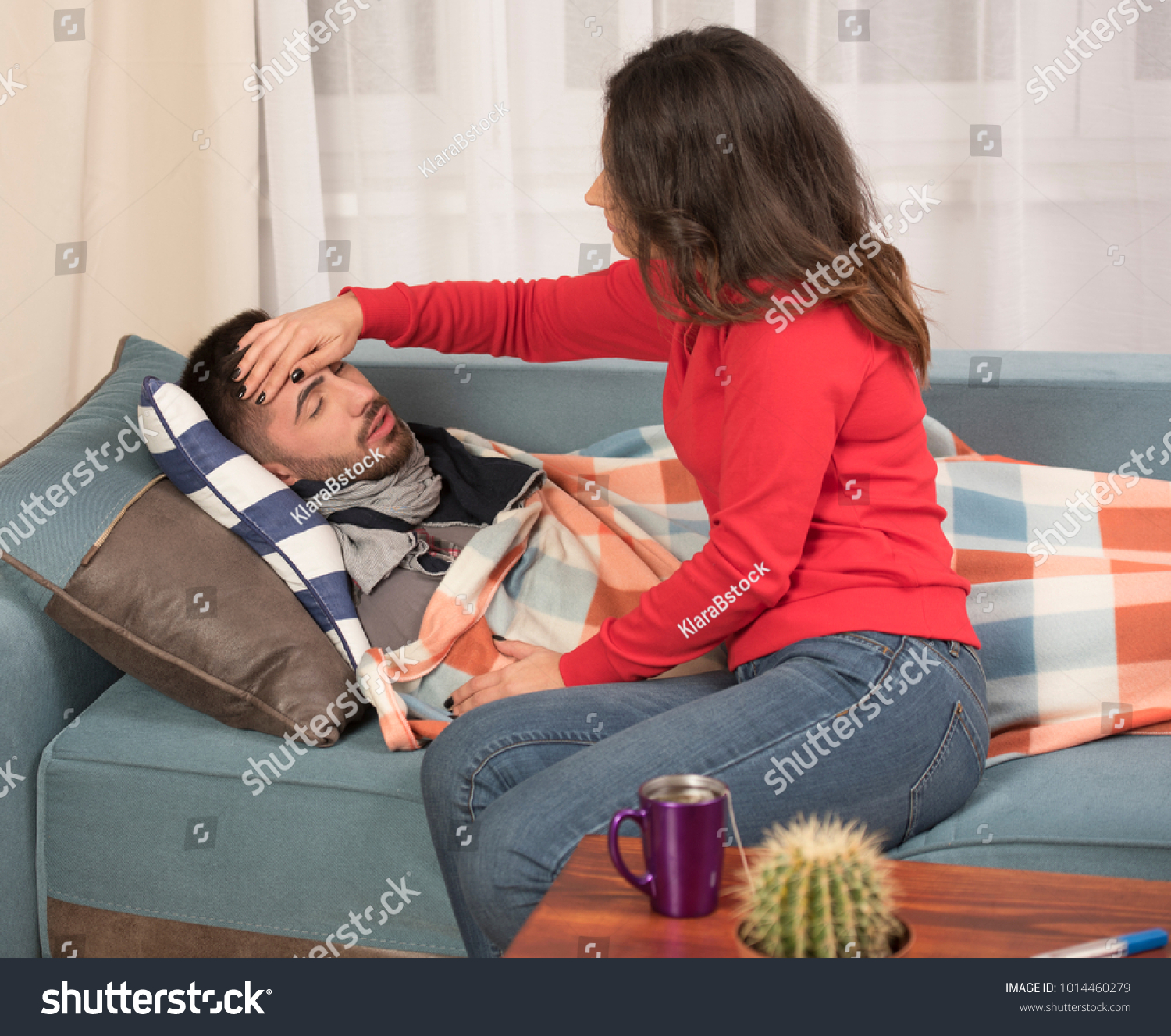 young-wife-taking-care-sick-husband-stock-photo-1014460279-shutterstock