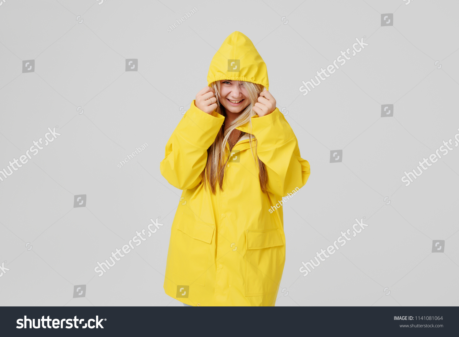 yellow rain slicker with hood