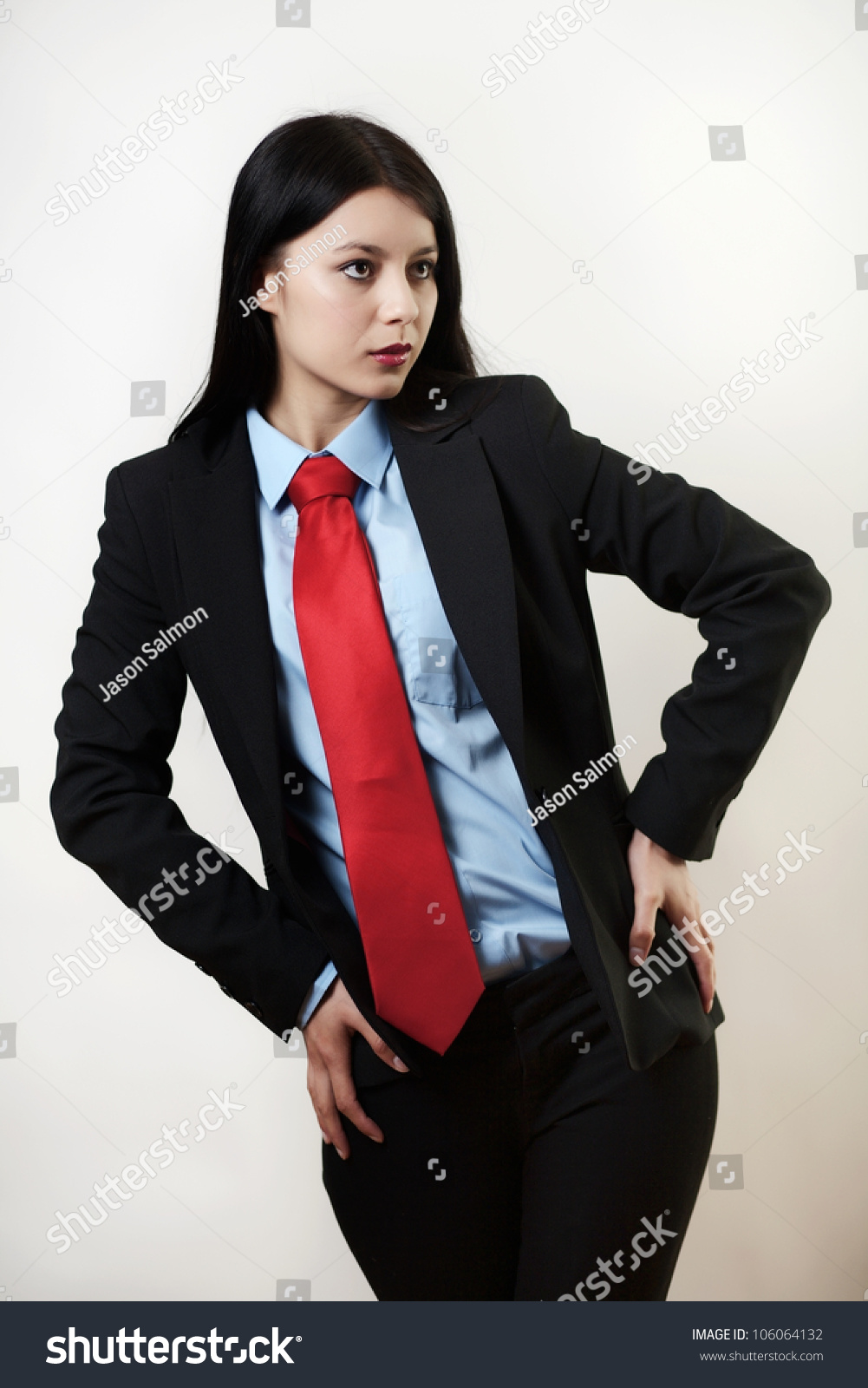 Young Woman Dressed Up In A Man Suit And Tie Stock Photo 106064132 ...