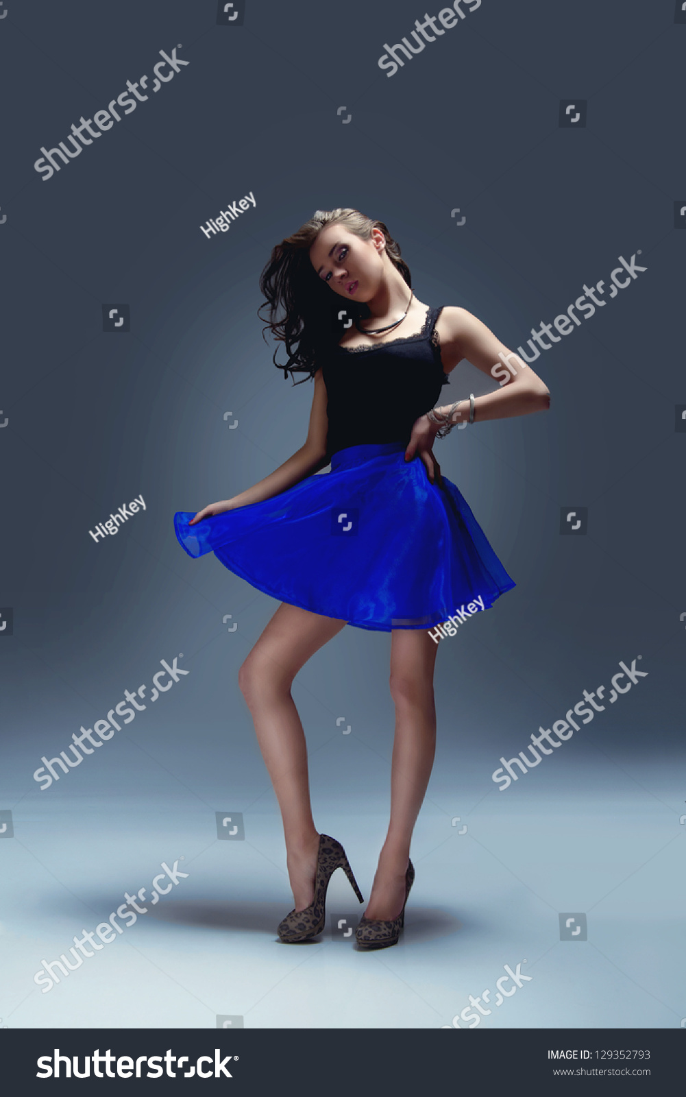 black top blue skirt