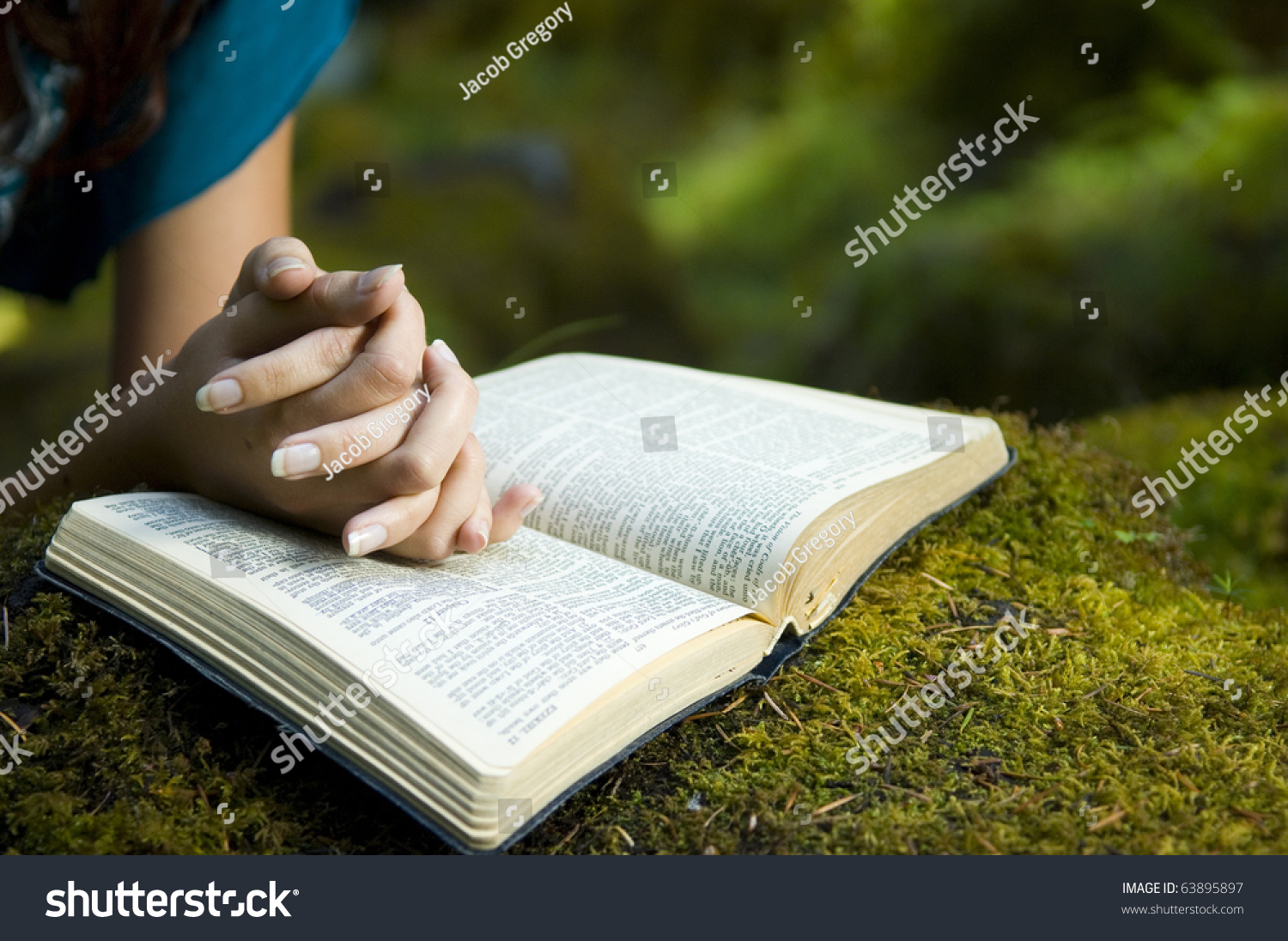 Young Woman Reading Bible By Stream Stock Photo 63895897 - Shutterstock