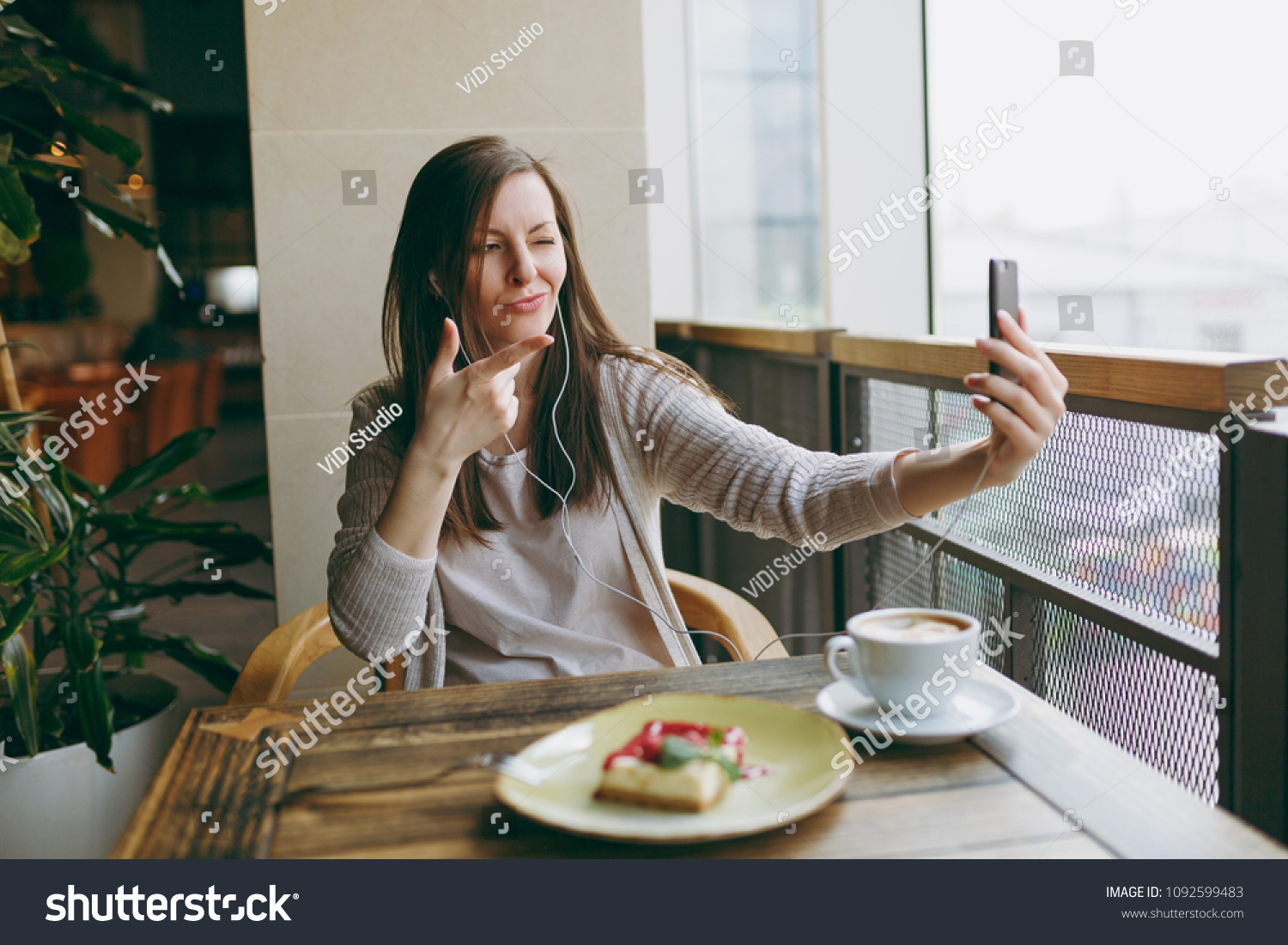 Young Woman Sitting Alone Coffee Shop Stock Photo 1092599483 | Shutterstock