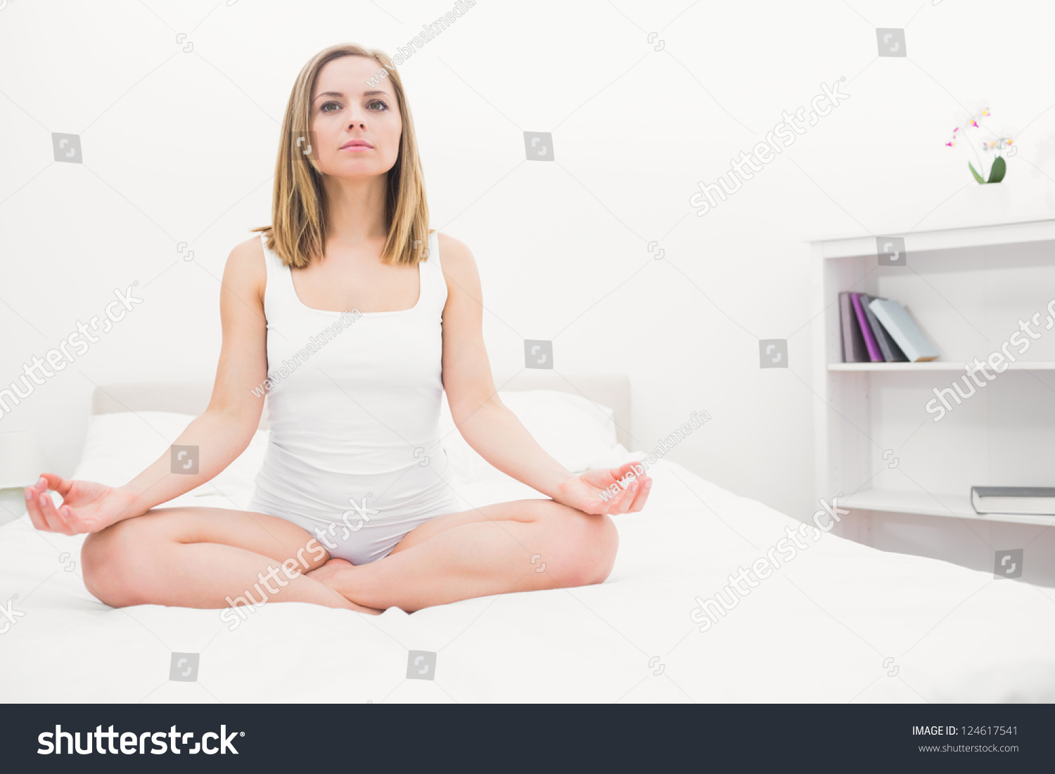 Young Woman Sitting Lotus Position On Stock Photo 124617541 - Shutterstock